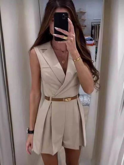 Vaco Statement Romper with belt In Beige