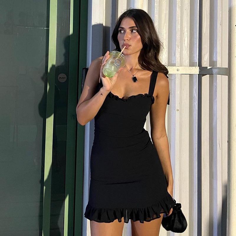 Nive Statement Mini Dress In Black